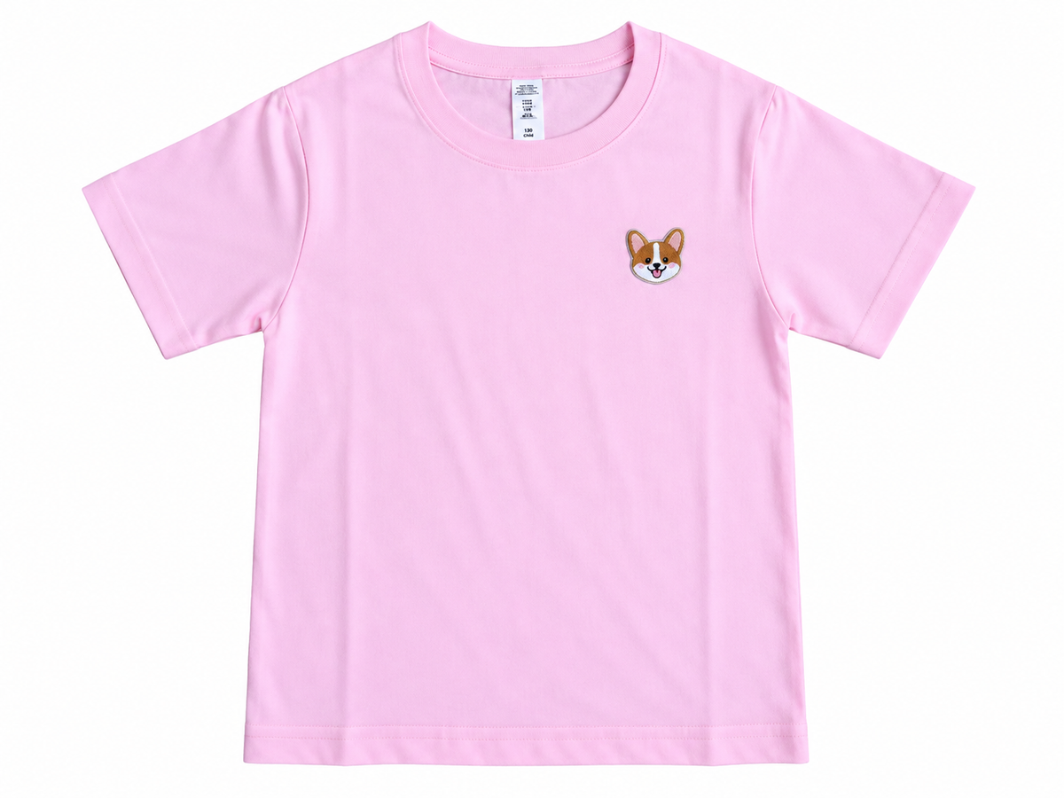 A light pink short-sleeve crewneck t-shirt featuring a small embroidered corgi face on the left chest, displayed flat against a white background.