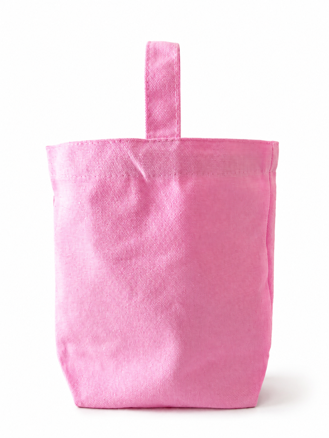 A light pink fabric tote bag with a matching top handle, shown against a plain white background.
